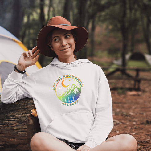 This hoodie features a colorful mountain graphic on the front and the inspiring saying "Not All Who Wander Are Lost" printed on the front.